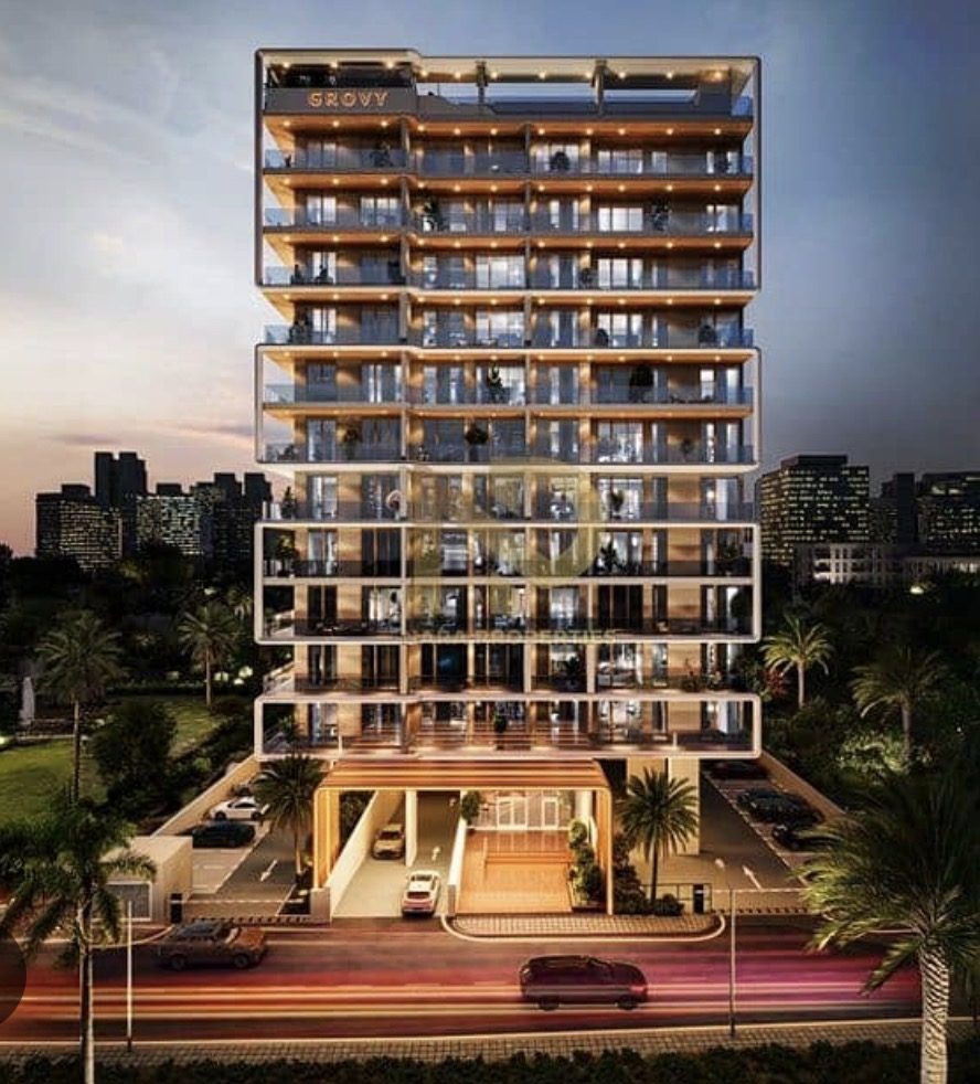 Grovy Residences apartment tower at night