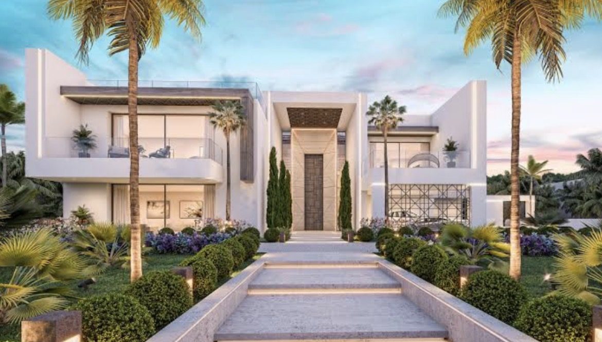 Modern villa with grand entrance and manicured landscaping